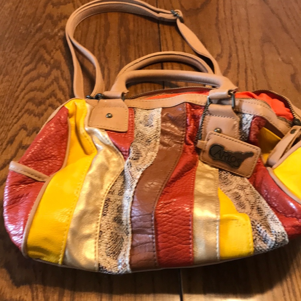 Carlos Santana multi colored bag